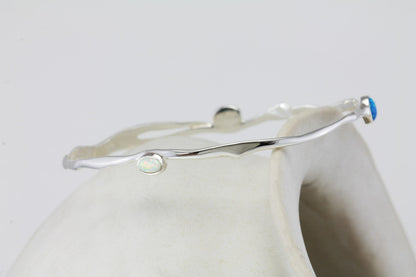 a trio of stunning sea blue Opalites. Made from high-quality sterling silver