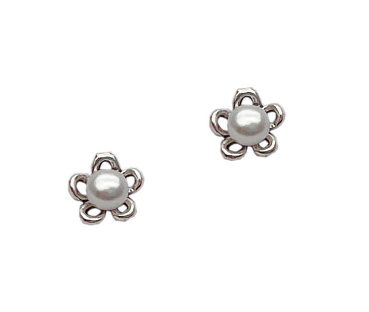 sterling silver studs featuring genuine white freshwater pearls set within a refined floral motif