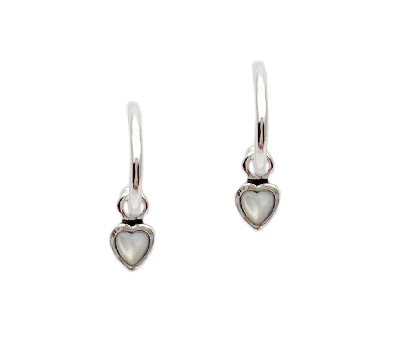 Delicate sterling silver hoops adorned with lustrous white pearl drops in a heart shape