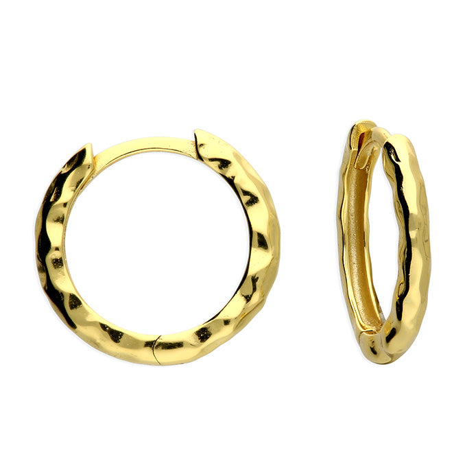 Gold hoop earrings on a white background