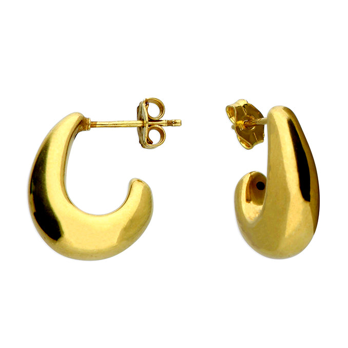 Gold hoop earrings on a white background