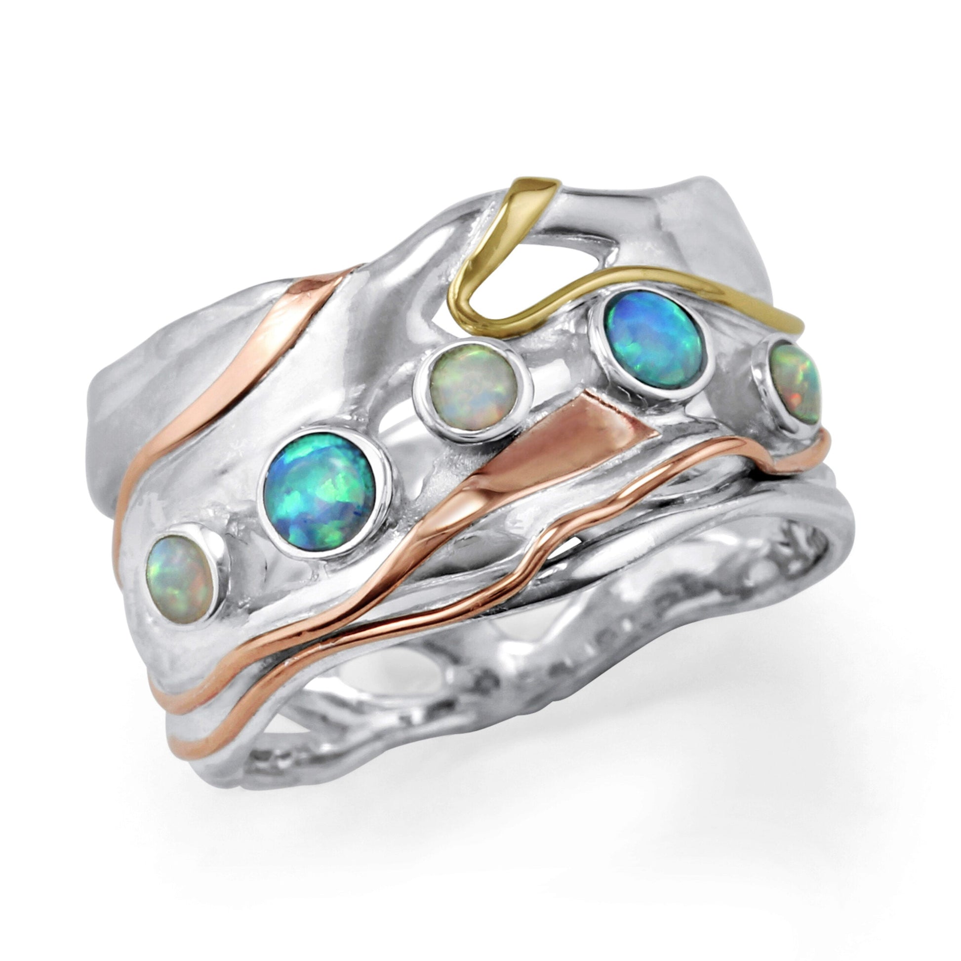 Silver ring with opal stones and gold accents on a white background