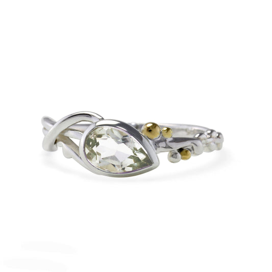 Peart shape green amethyst stone set in Sterling Silver with gold detail on tiny balls next to the stone