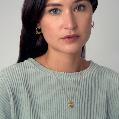 Alex Monroe 22 carat Yellow Gold Vermeil Sea Turtle Necklace worn by a model